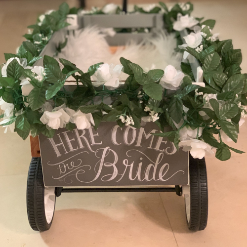 Furever Us rental cart with flowers for wedding dog