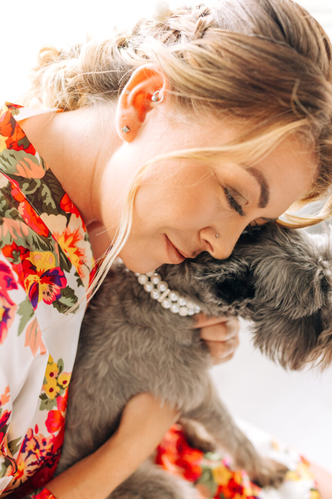 bride holding dog of honor